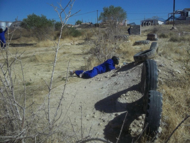  Lying on the ground with the marker